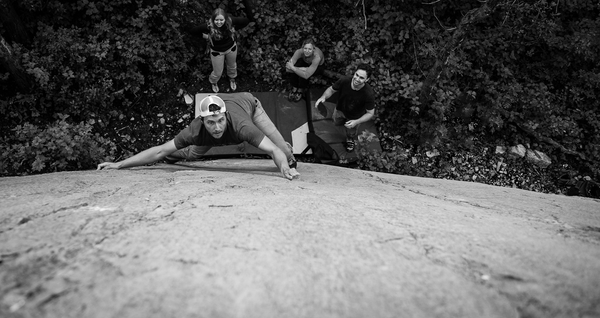 Canadian rock climber and photographer Philip QUade bouldering at Big Choss near Calgary, Alberta.